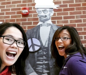 Jarely Ventura and Anabella Lochman pose with a ‘groovy Lincoln’ cutout in the A.Lincoln Commons. 